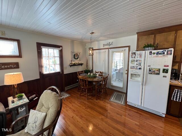 663 Fleming Road Coats, NC 27521 - Photo 7 of 42 a living room with furniture a dining table and a refrigerator