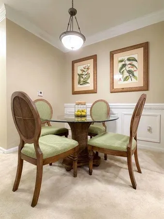 a view of a workspace with furniture