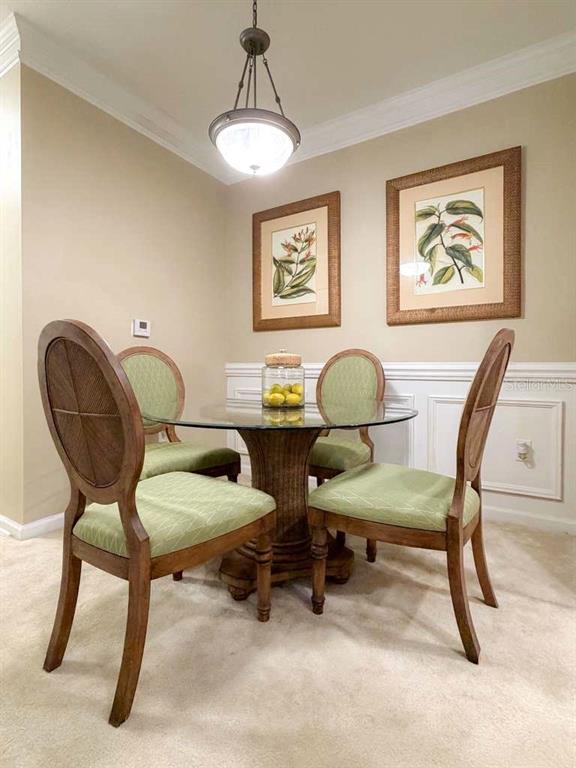 12843 Madison Pointe Circle, Unit 107 Orlando, FL 32821 - Photo 9 of 26 a view of a workspace with furniture