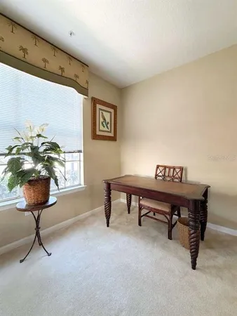 a view of a livingroom with furniture
