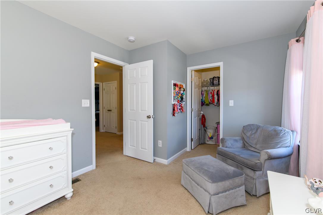 512 Racite Road Alburtis, PA 18011 - Photo 18 of 32 a living room with furniture and a dresser