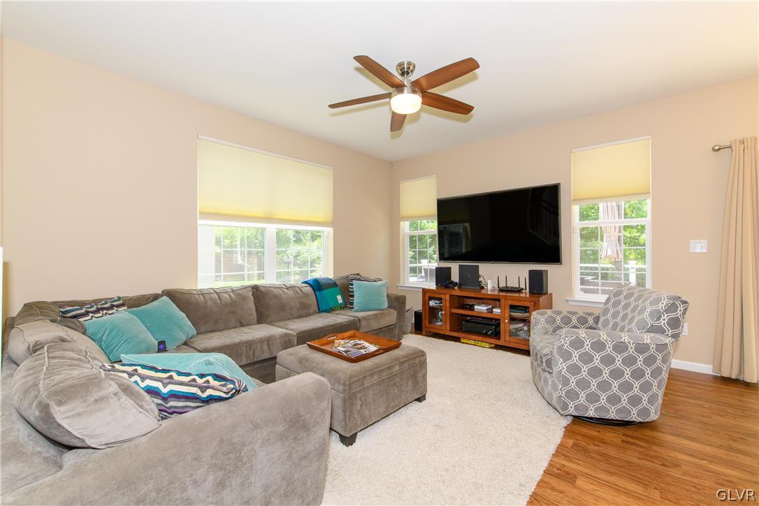 512 Racite Road Alburtis, PA 18011 - Photo 2 of 32 a living room with furniture and a flat screen tv