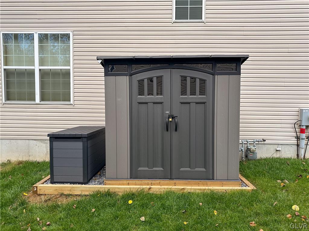 512 Racite Road Alburtis, PA 18011 - Photo 29 of 32 a front view of a house with a yard