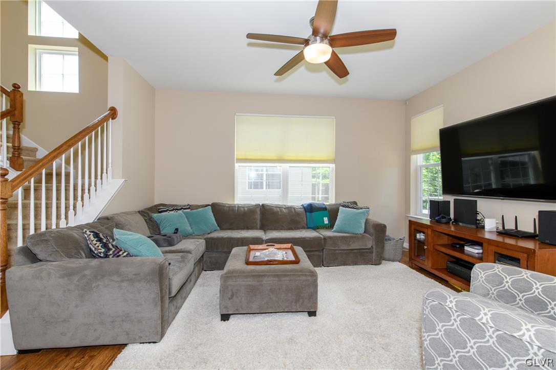 512 Racite Road Alburtis, PA 18011 - Photo 4 of 32 a living room with furniture and a flat screen tv