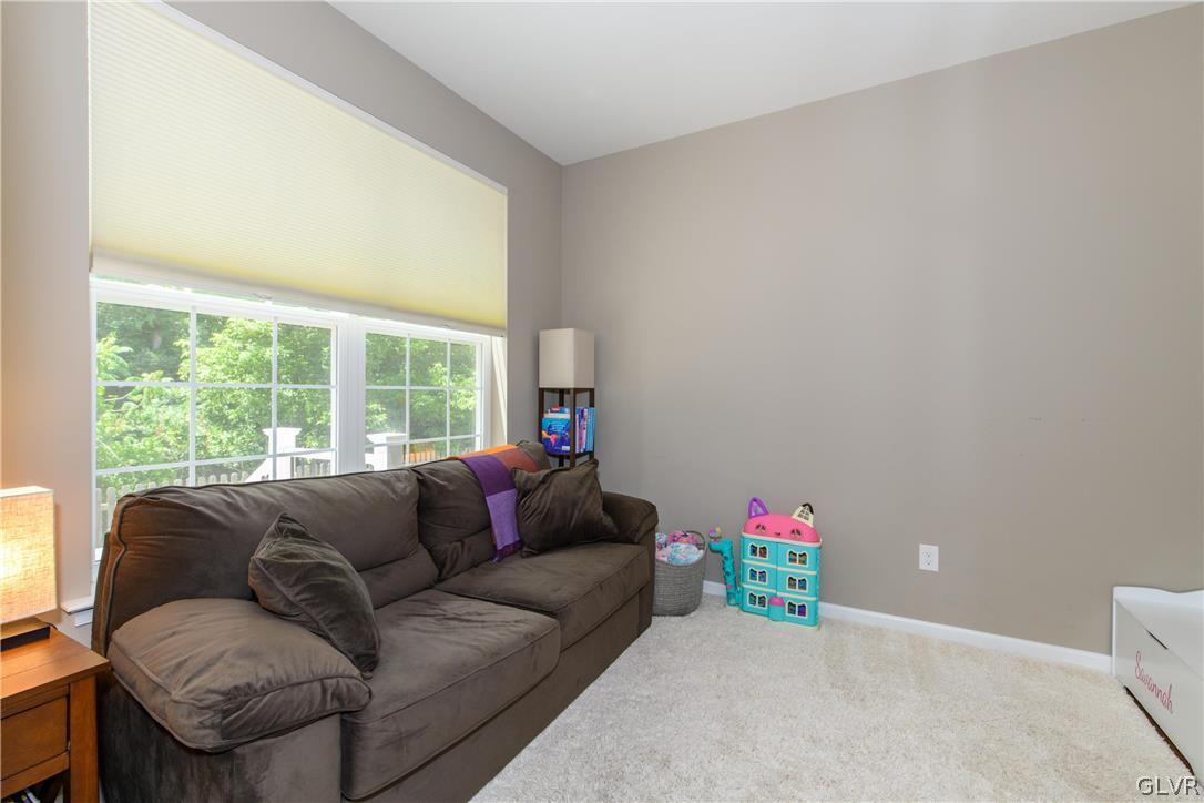 512 Racite Road Alburtis, PA 18011 - Photo 6 of 32 a living room with furniture and a large window