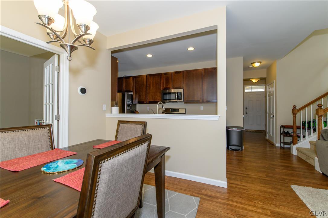 512 Racite Road Alburtis, PA 18011 - Photo 10 of 32 a view of a dining room with furniture and wooden floor