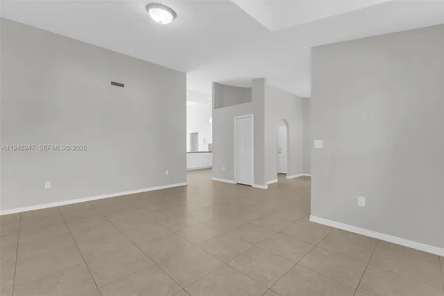 a view of an empty room with window