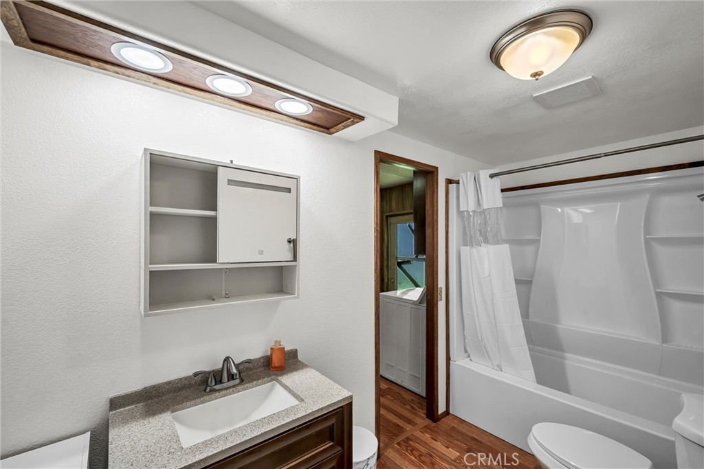 3384 State Highway 20 Nice, CA 95464 - Photo 13 of 24 a bathroom with a sink and a mirror