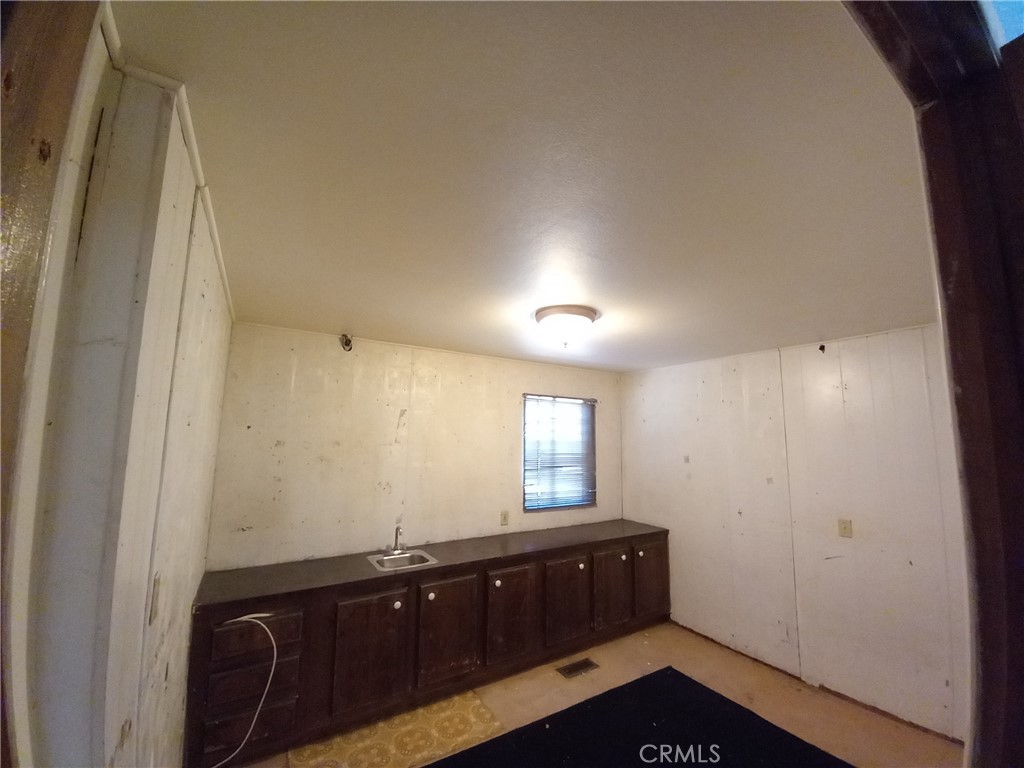 3384 State Highway 20 Nice, CA 95464 - Photo 17 of 24 a room with a sink and a mirror