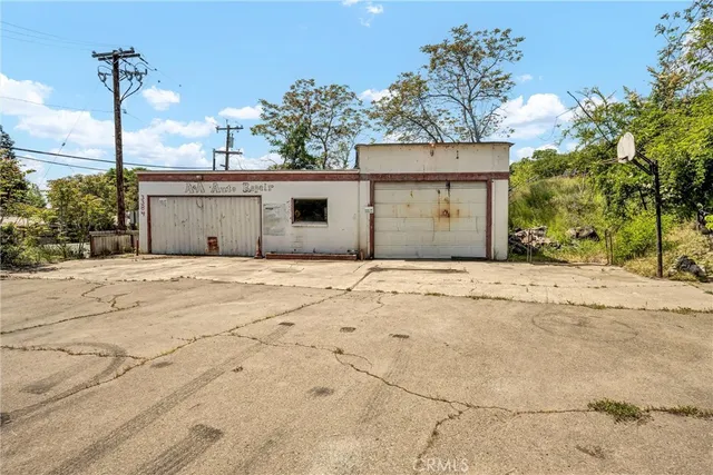 a view of a backyard of a house