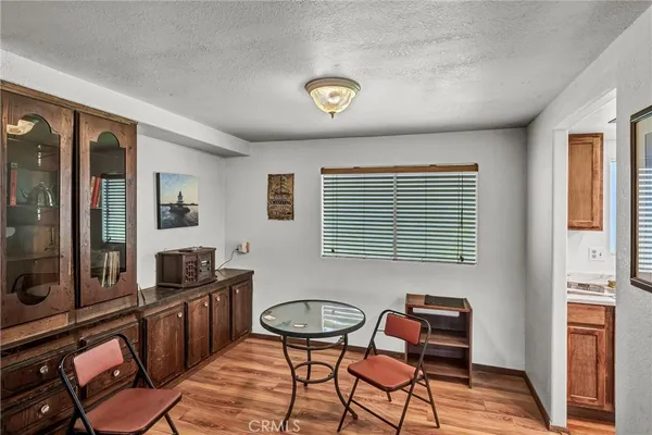 a view of a livingroom with furniture and windows