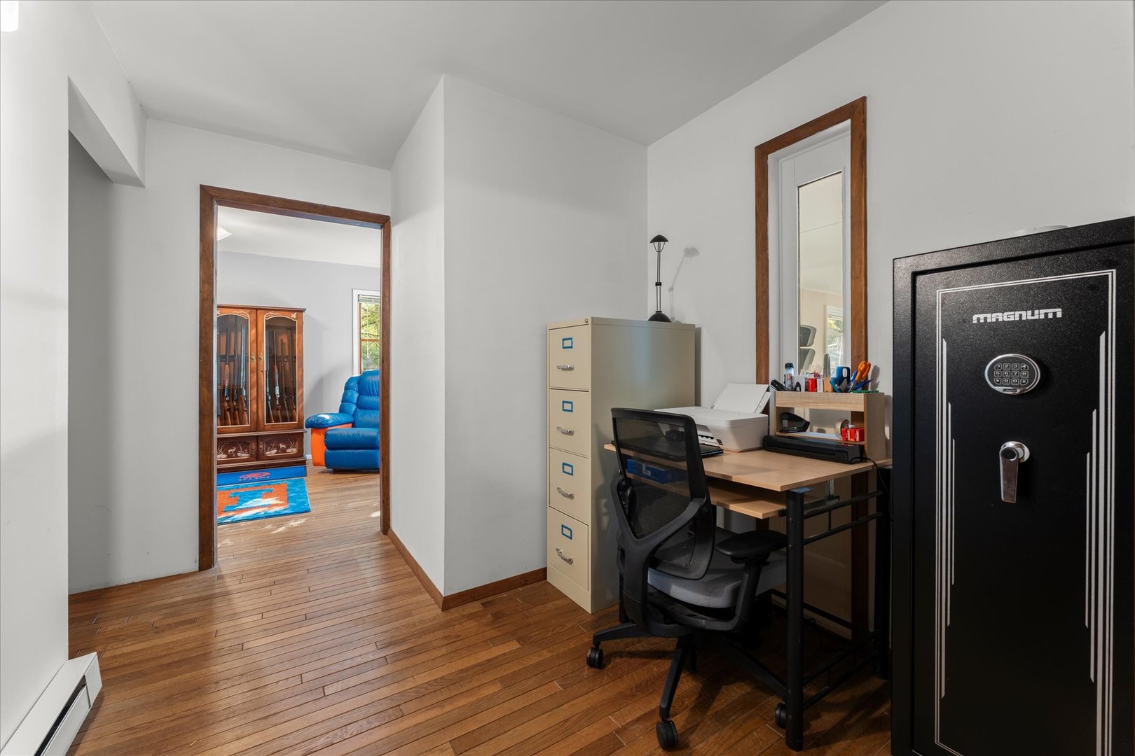 1108 Riverside Court Mahomet, IL 61853 - Photo 26 of 50 a view of a workspace with furniture and wooden floor