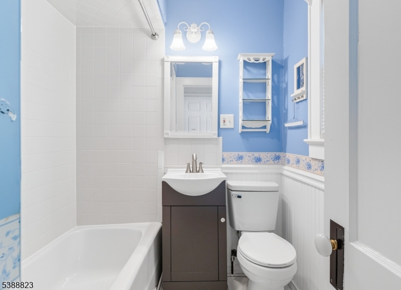 115 Billian Street, Unit 2 Bridgewater, NJ 08807 - Photo 7 of 10 a bathroom with a sink a toilet and shower