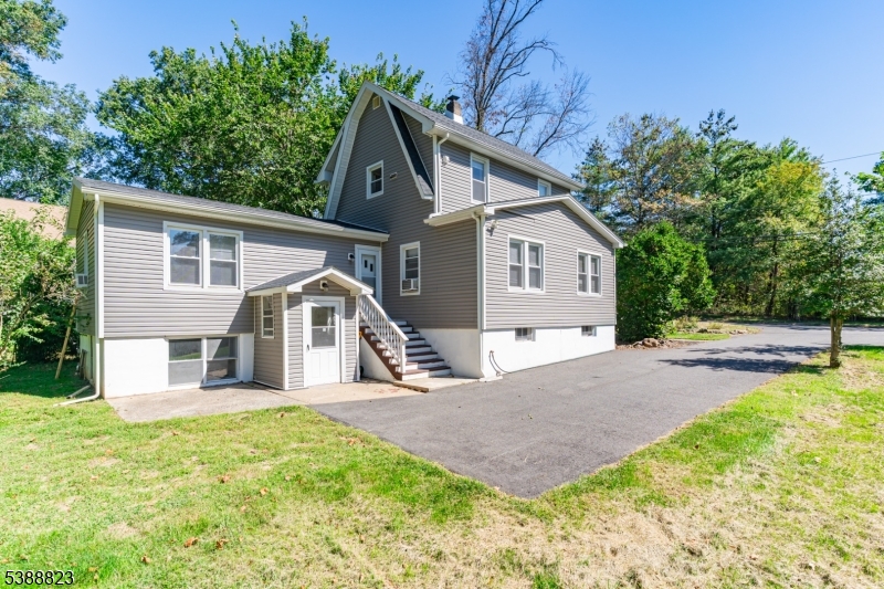 115 Billian Street, Unit 2 Bridgewater, NJ 08807 - Photo 10 of 10 a view of a house with a yard and large tree