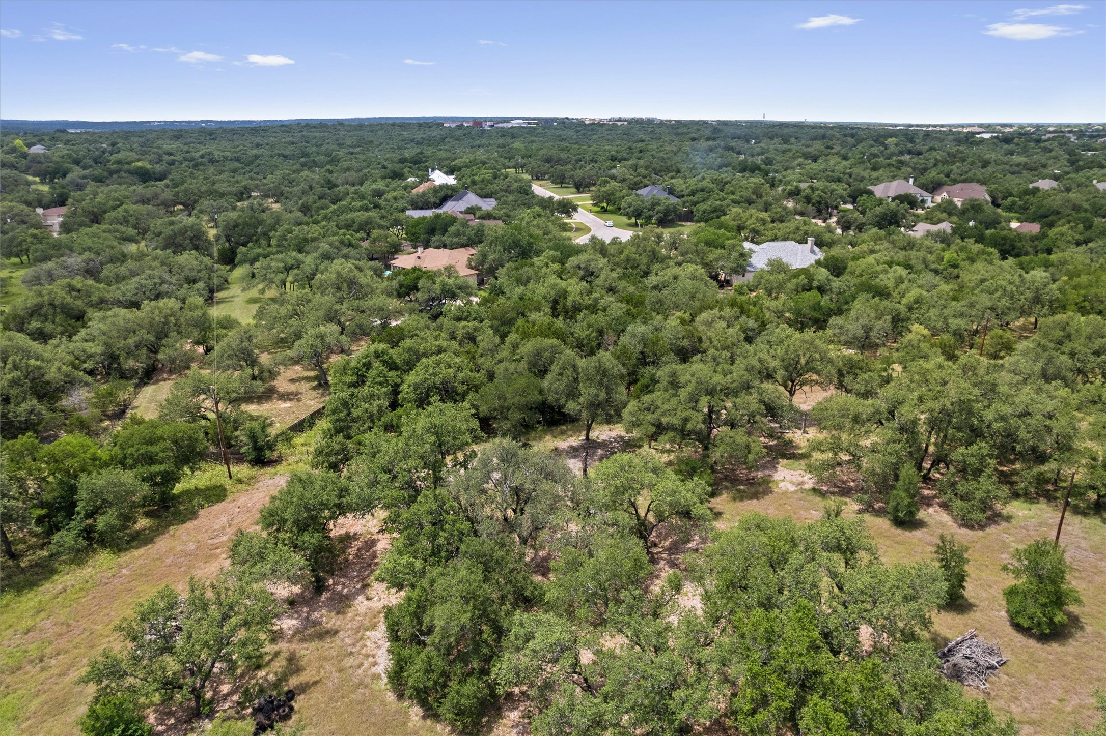 120 East Rustle Cove Georgetown, TX 78628 - Photo 14 of 25 an aerial view of residential houses with outdoor space and trees