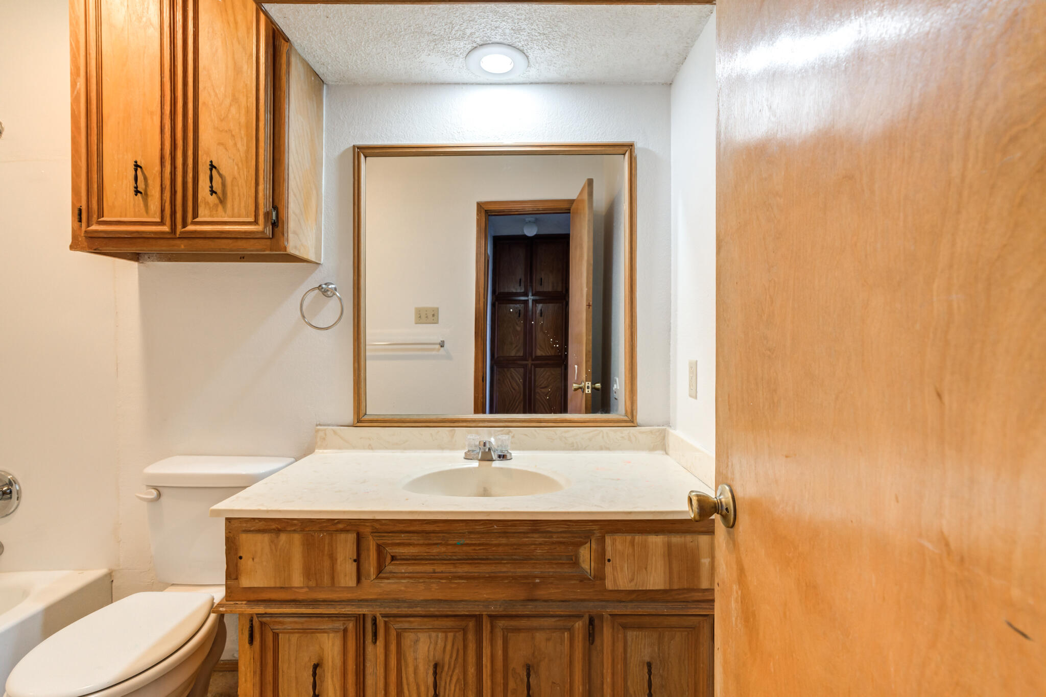 7405 Waco Avenue Lubbock, TX 79423 - Photo 25 of 29 a bathroom with a sink and a toilet