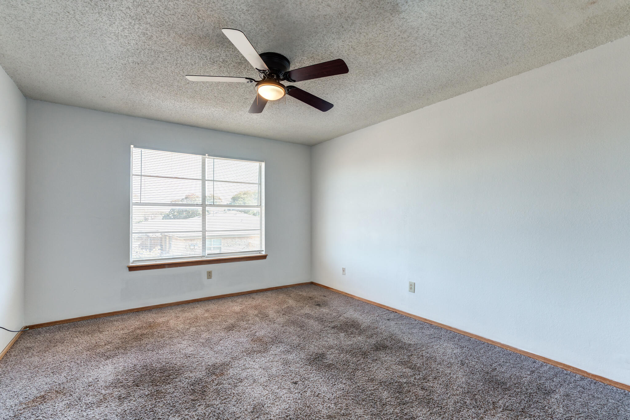 7405 Waco Avenue Lubbock, TX 79423 - Photo 29 of 29 a view of an empty room with a window