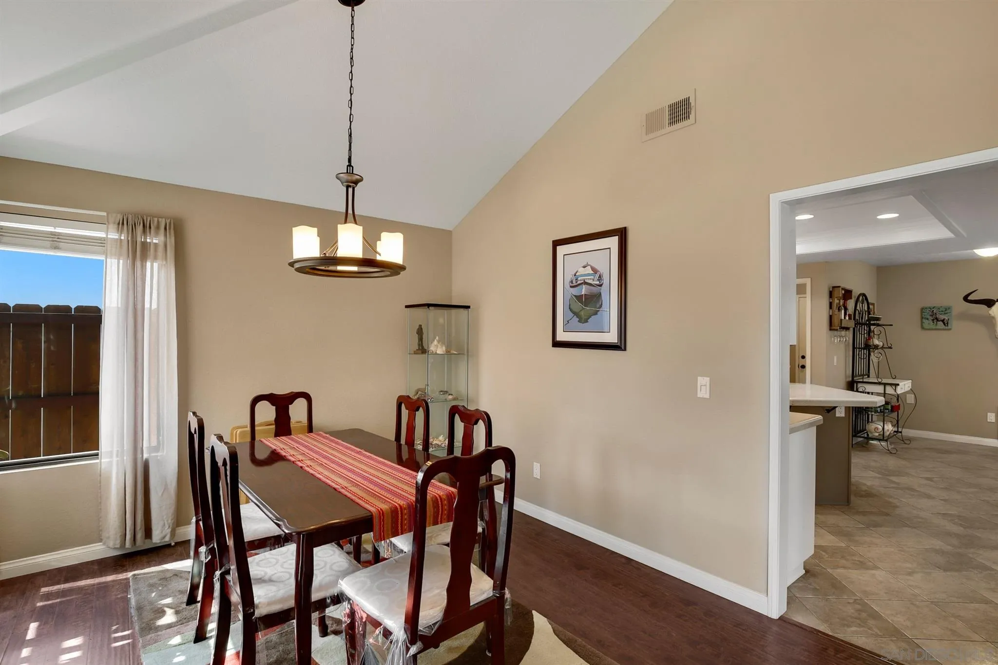 1753 Harold Road Escondido, CA 92026 - Photo 11 of 28 a view of a dining room with furniture window and wooden floor