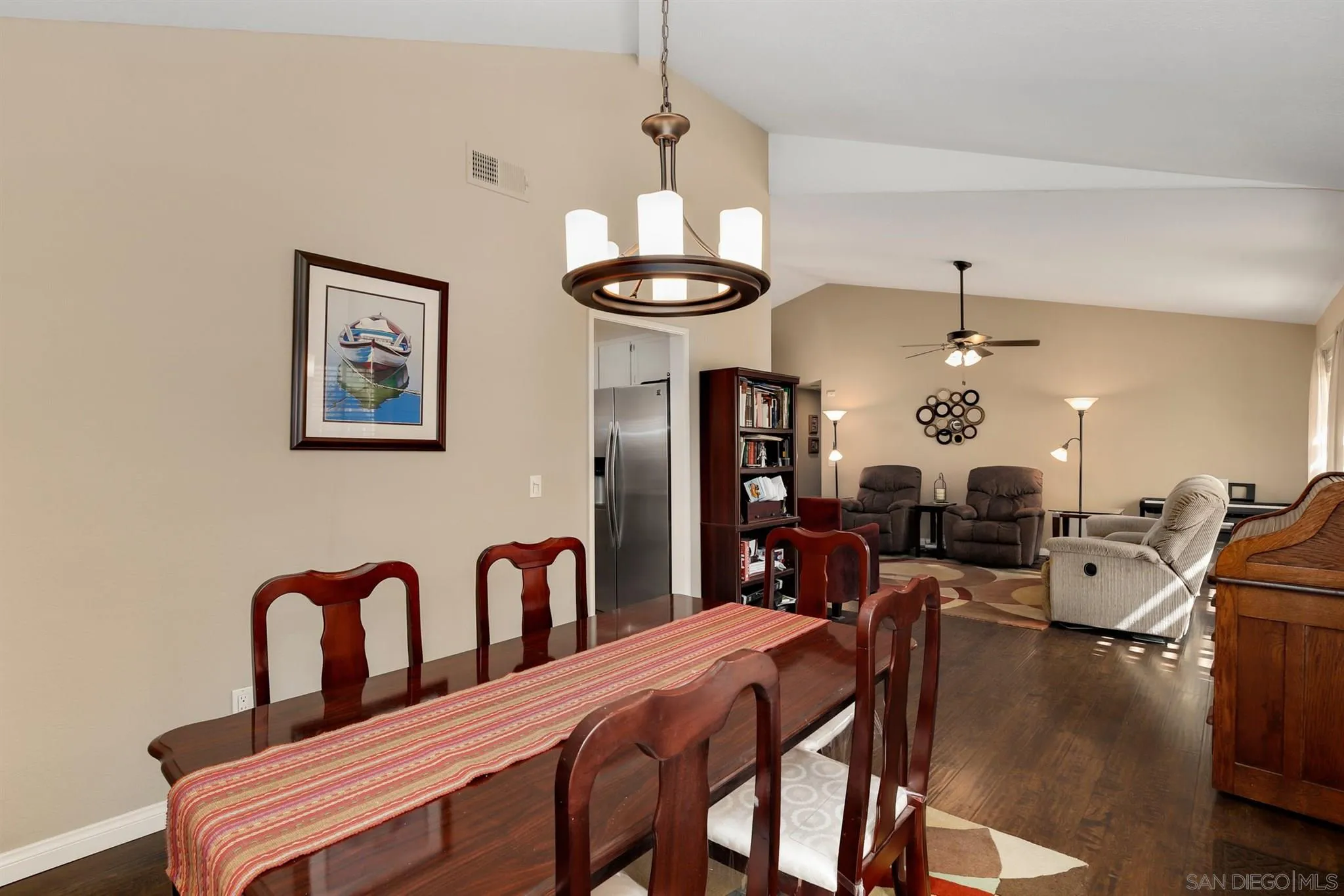 1753 Harold Road Escondido, CA 92026 - Photo 13 of 28 a view of a dining room with furniture window and wooden floor