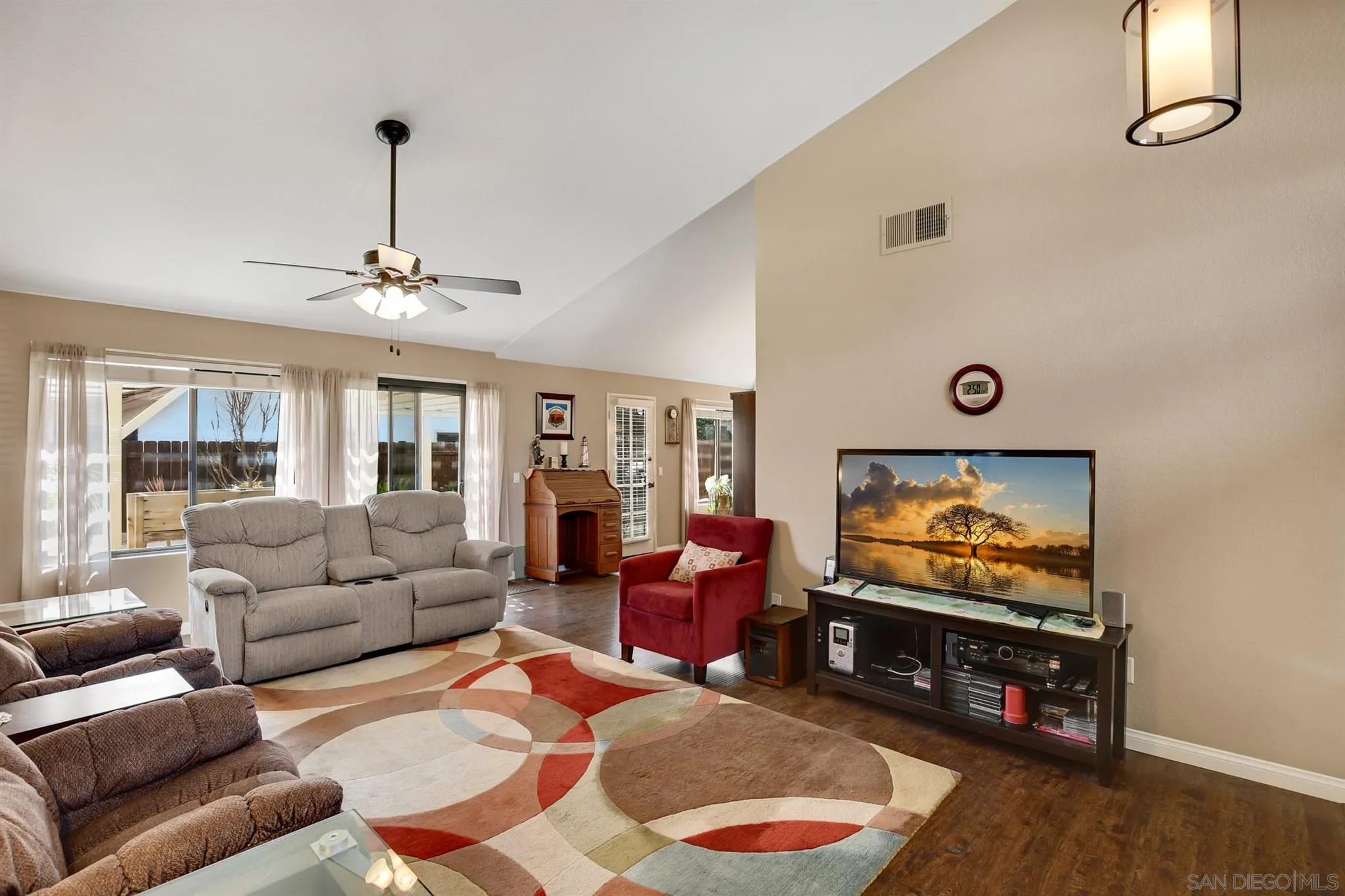 1753 Harold Road Escondido, CA 92026 - Photo 3 of 28 a living room with furniture and a flat screen tv