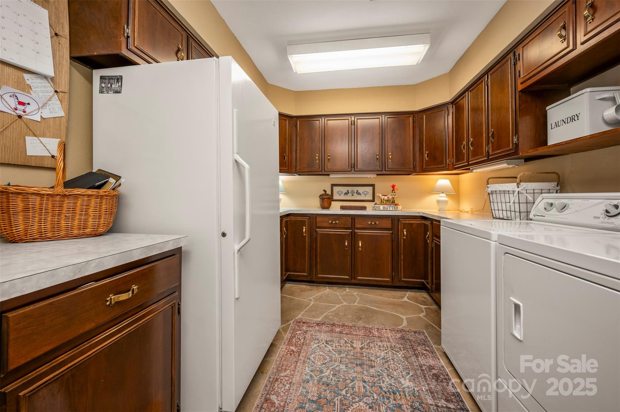 550 Ridgetop Road Tryon, NC 28782 - Photo 13 of 39 a kitchen with stainless steel appliances granite countertop a refrigerator a sink a stove and a refrigerator
