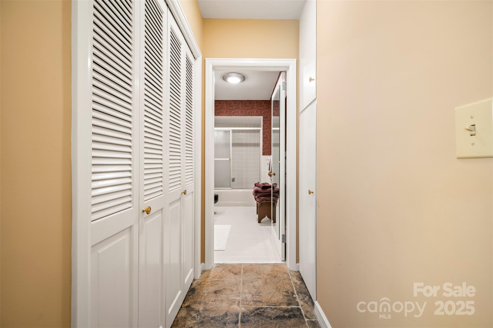 550 Ridgetop Road Tryon, NC 28782 - Photo 26 of 39 a view of a bathroom from a corridor