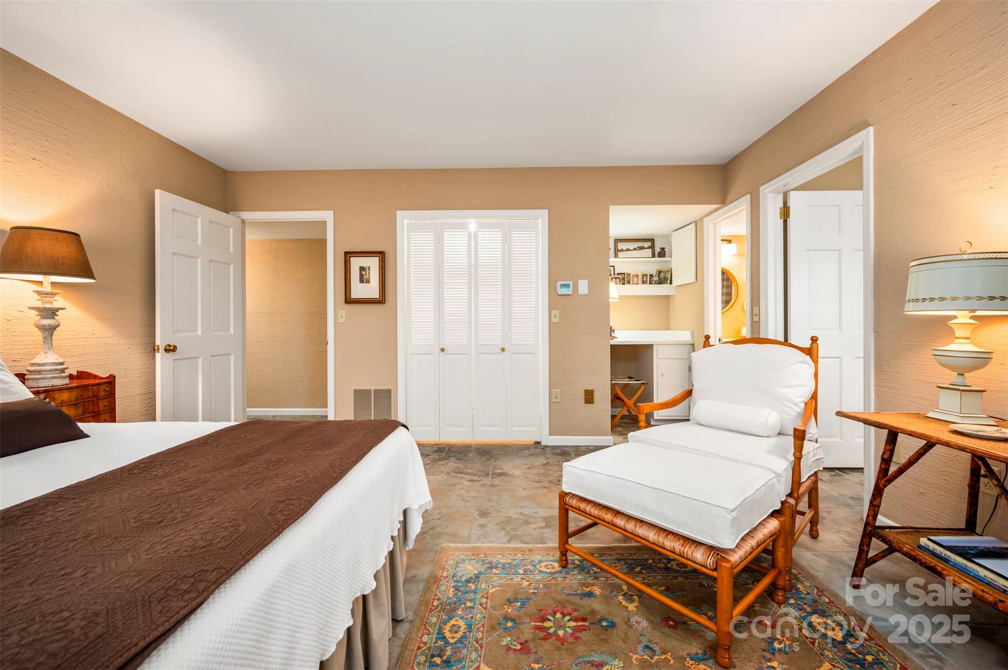 550 Ridgetop Road Tryon, NC 28782 - Photo 29 of 39 a bedroom with furniture and a dresser