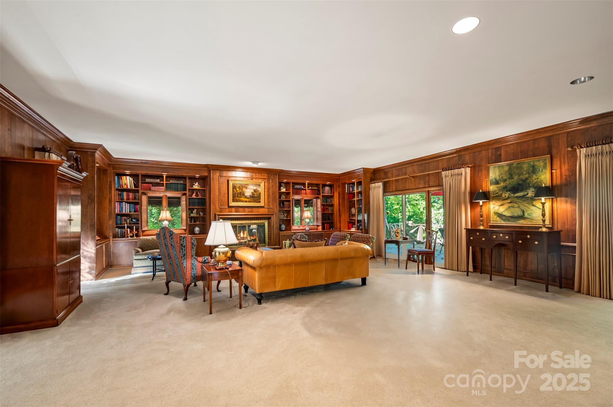 550 Ridgetop Road Tryon, NC 28782 - Photo 4 of 39 a living room with furniture and a flat screen tv