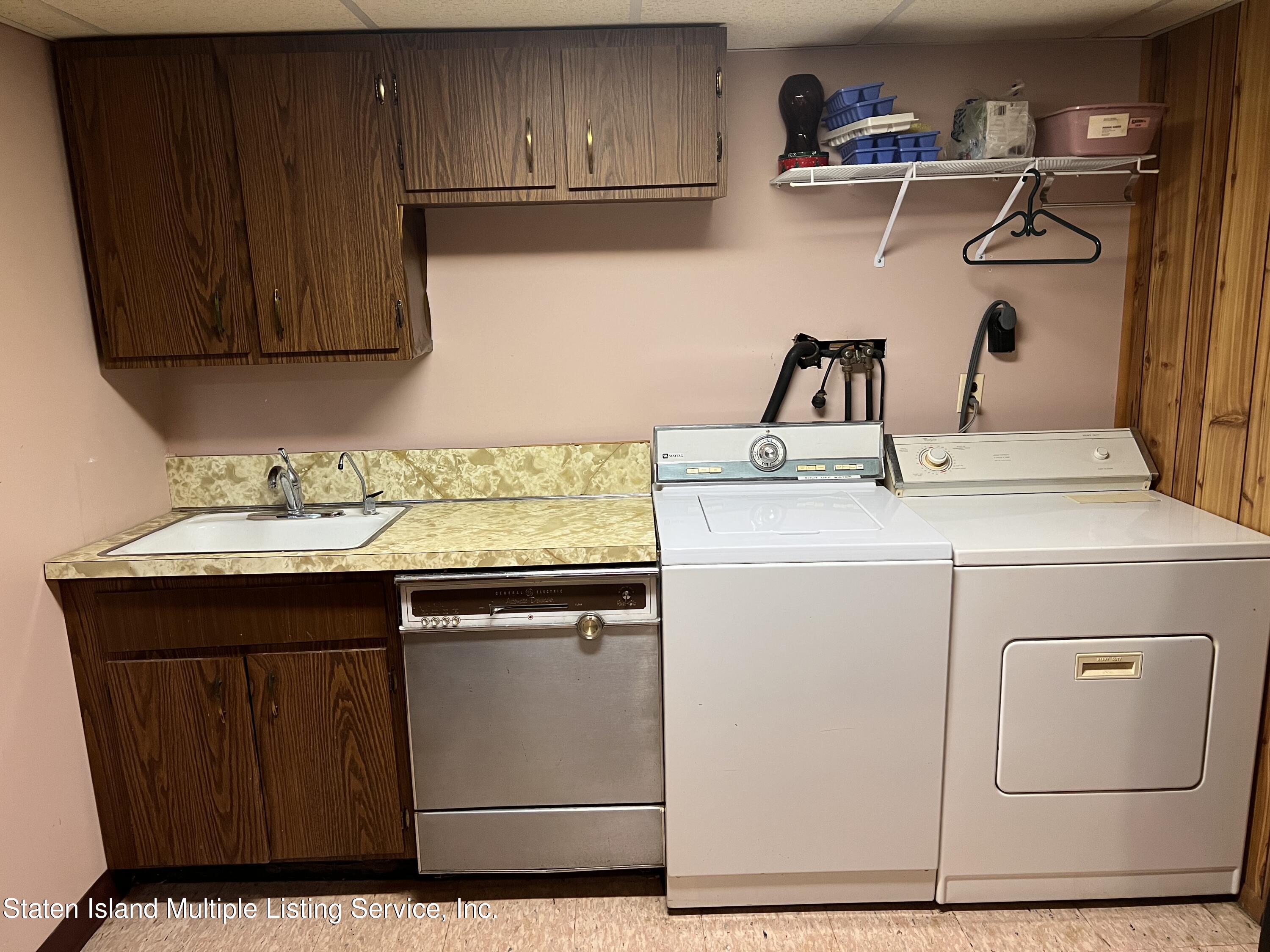 2760 Amboy Road Staten Island, NY 10306 - Photo 13 of 16 a utility room with dryer and washer