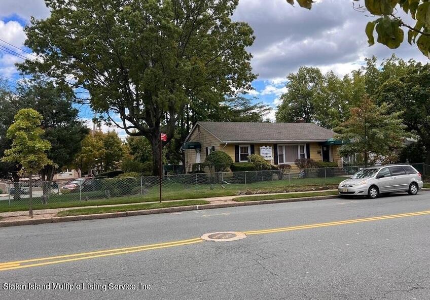 2760 Amboy Road Staten Island, NY 10306 - Photo 2 of 16 a view of street with houses and trees