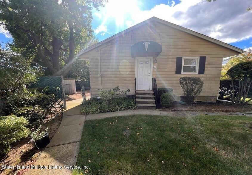 2760 Amboy Road Staten Island, NY 10306 - Photo 4 of 16 a view of a house with backyard