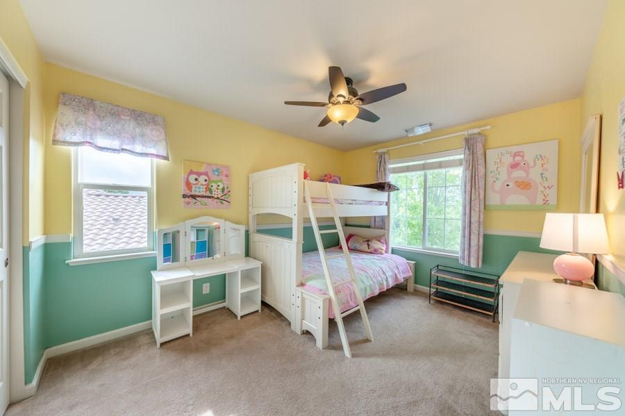 2104 Hazelcrest Drive Reno, NV 89521 - Photo 22 of 27 a bedroom with a bed and a window