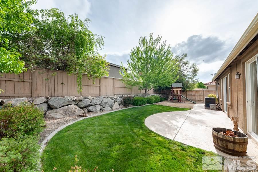 2104 Hazelcrest Drive Reno, NV 89521 - Photo 24 of 27 a view of a backyard with sitting area and furniture