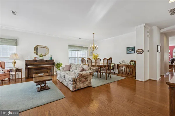 a view of front of house with a yard