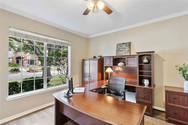 a room with furniture and a large window