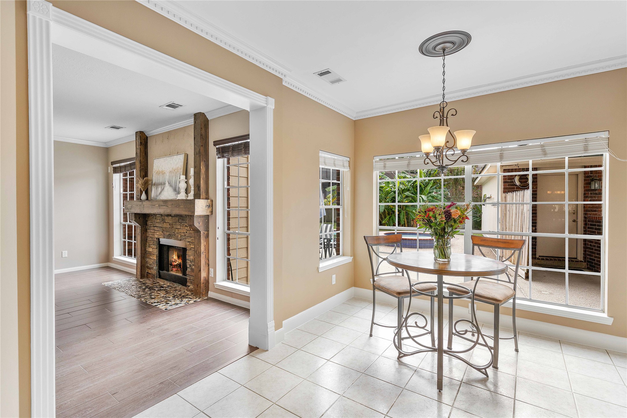 19819 Cherry Oaks Lane Humble, TX 77346 - Photo 18 of 47 Adjacent to the living room is a bright breakfast area with room to sit and eat your dinner while admiring the outside patio and pool.