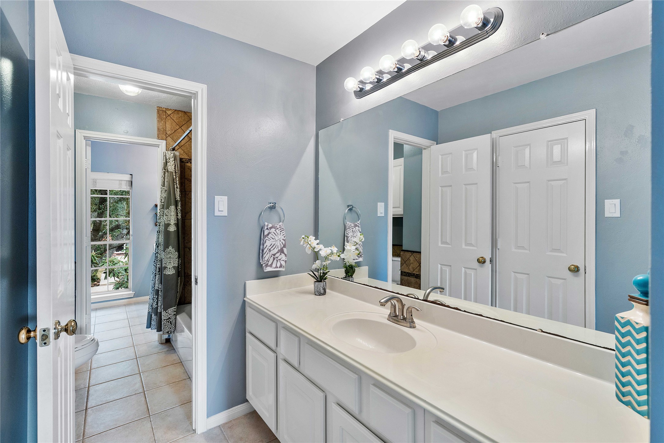 19819 Cherry Oaks Lane Humble, TX 77346 - Photo 36 of 47 this Jack and Jill bathroom shower sits between two upstairs bedrooms, perfect for two daughters or sons to share while having their own areas to get ready.