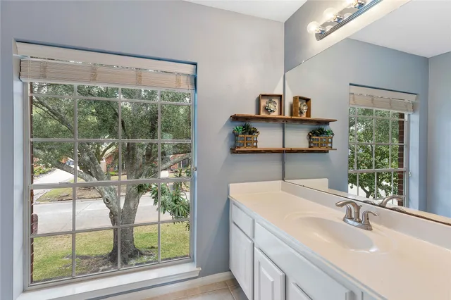 an outdoor space with swimming pool and furniture