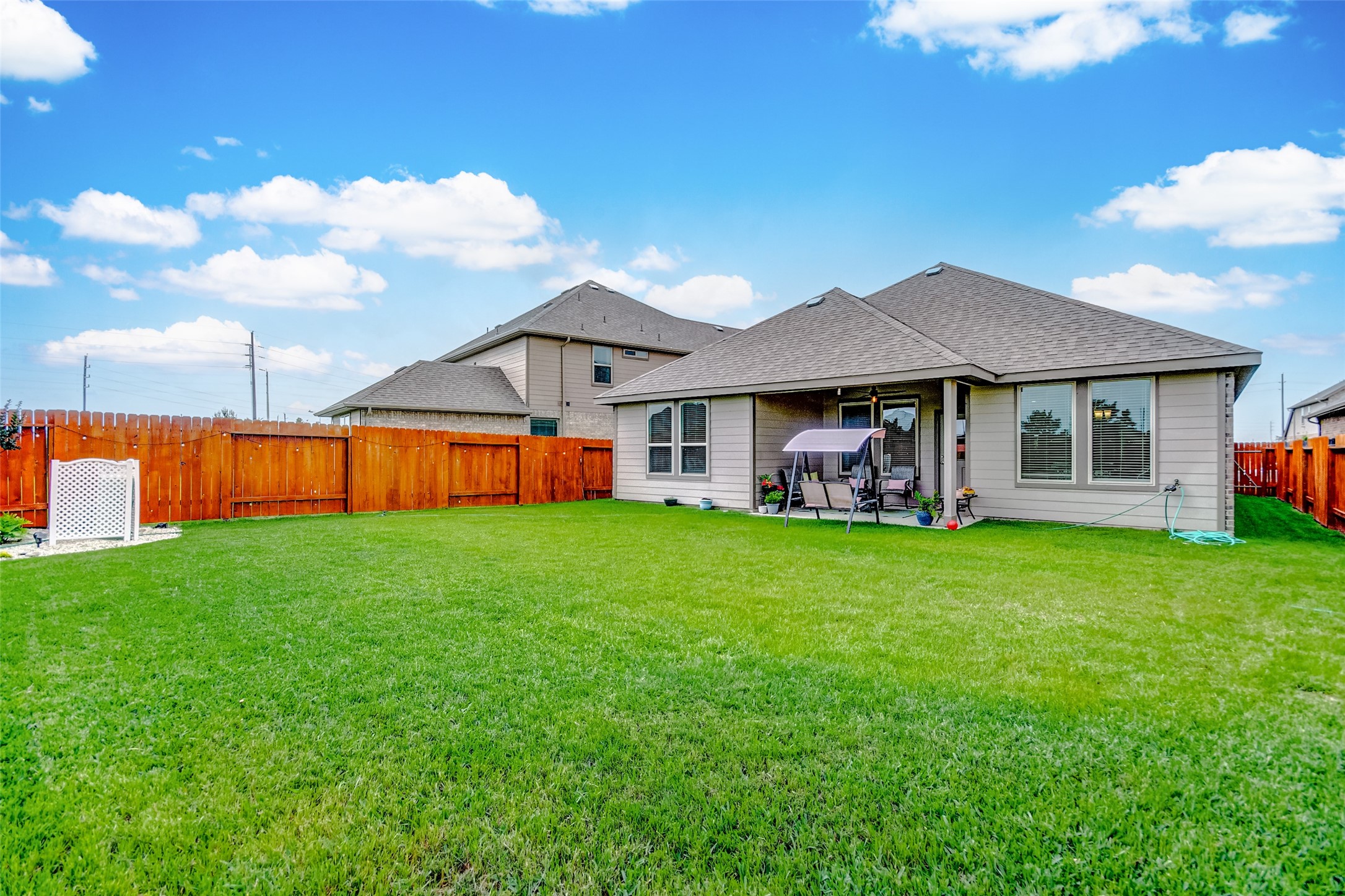 4239 Prairie Landing Lane Katy, TX 77494 - Photo 32 of 32 a view of a house with a big yard and large tree