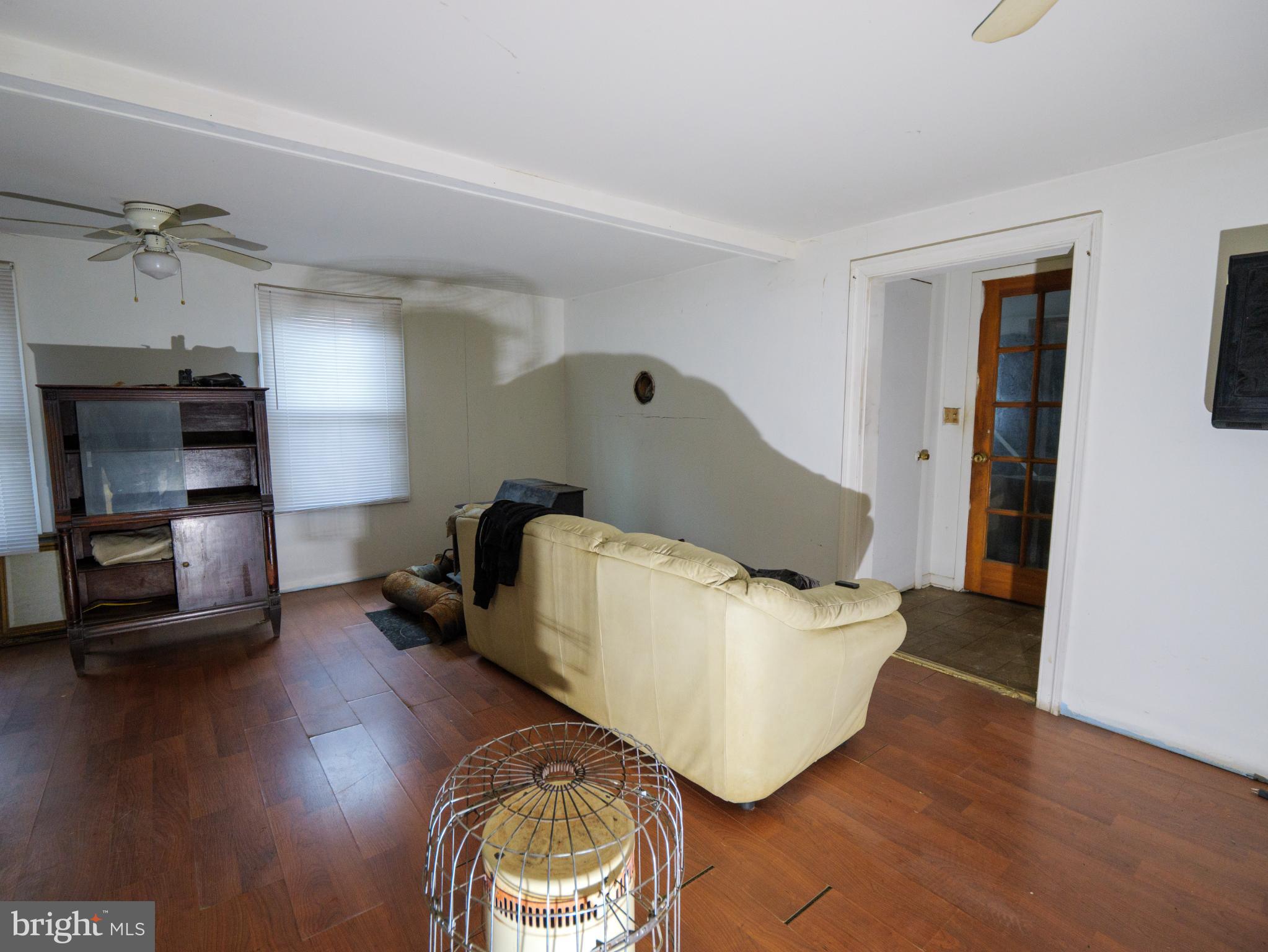 896 Mt Zion Marlboro Road Lothian, MD 20711 - Photo 8 of 22 a living room with furniture and a flat screen tv