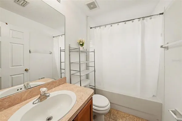 a view of a storage & utility room with washer and dryer