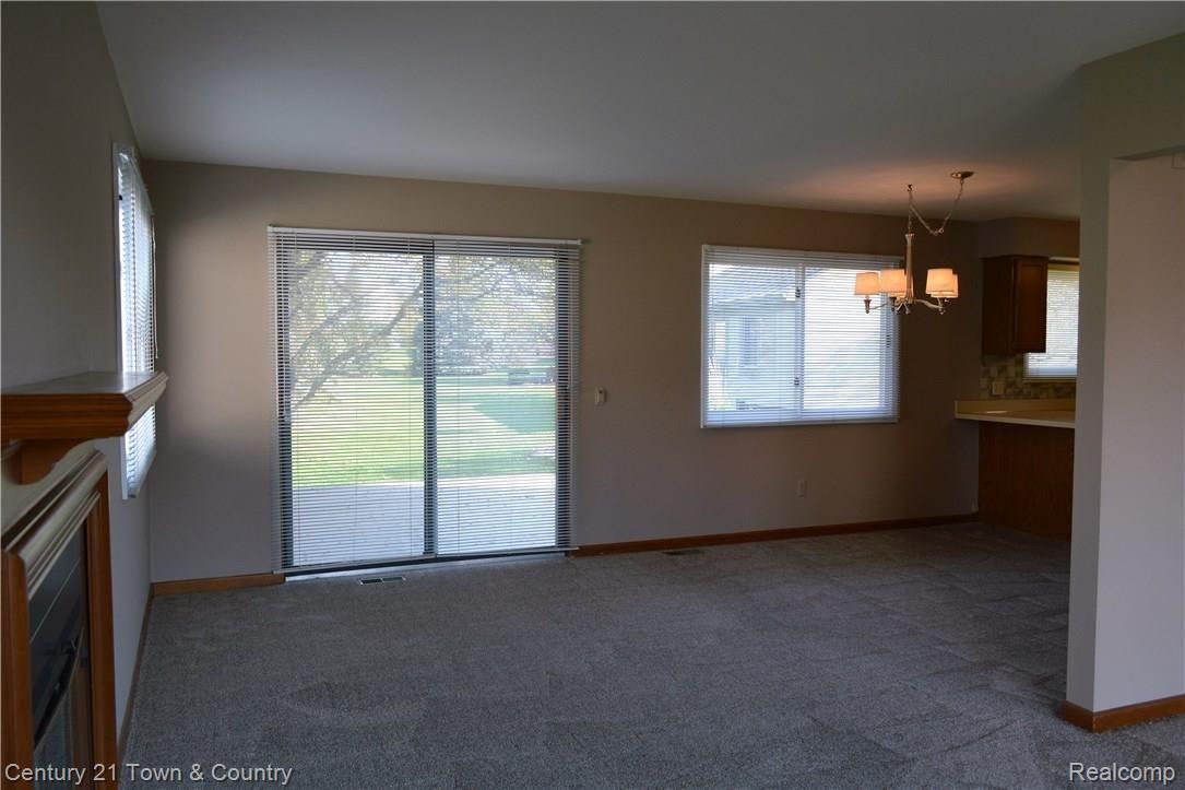 1521 Colony Drive Rochester, MI 48307 - Photo 11 of 37 Door wall leads onto deck