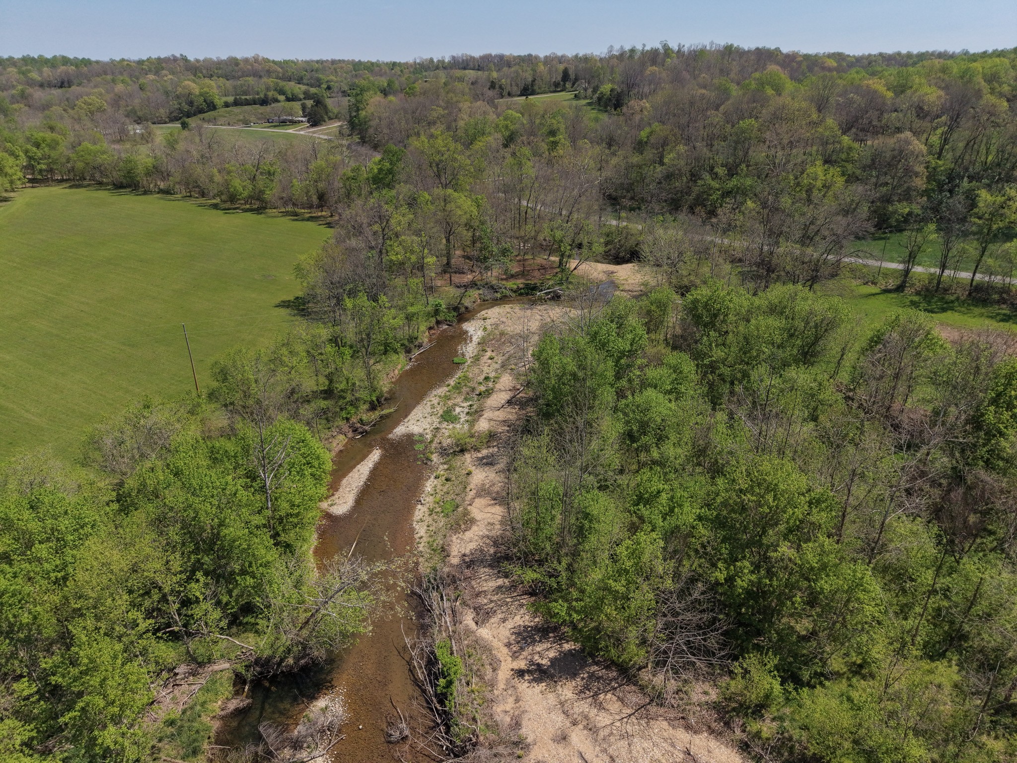 0 Batson Road Cumberland Furnace, TN 37051 - Photo 12 of 13 an aerial view of green landscape with trees houses and mountain view