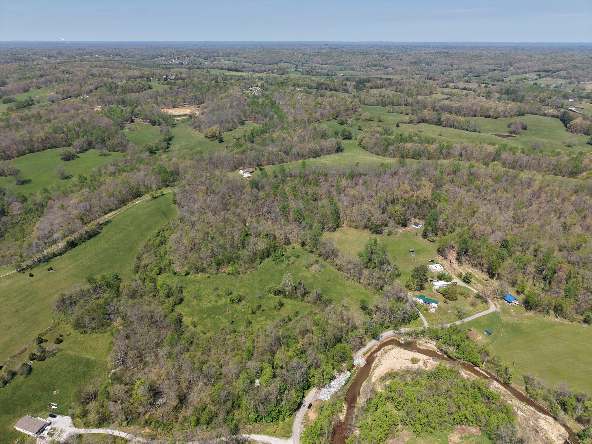 0 Batson Road Cumberland Furnace, TN 37051 - Photo 3 of 13 a view of a city with lush green forest