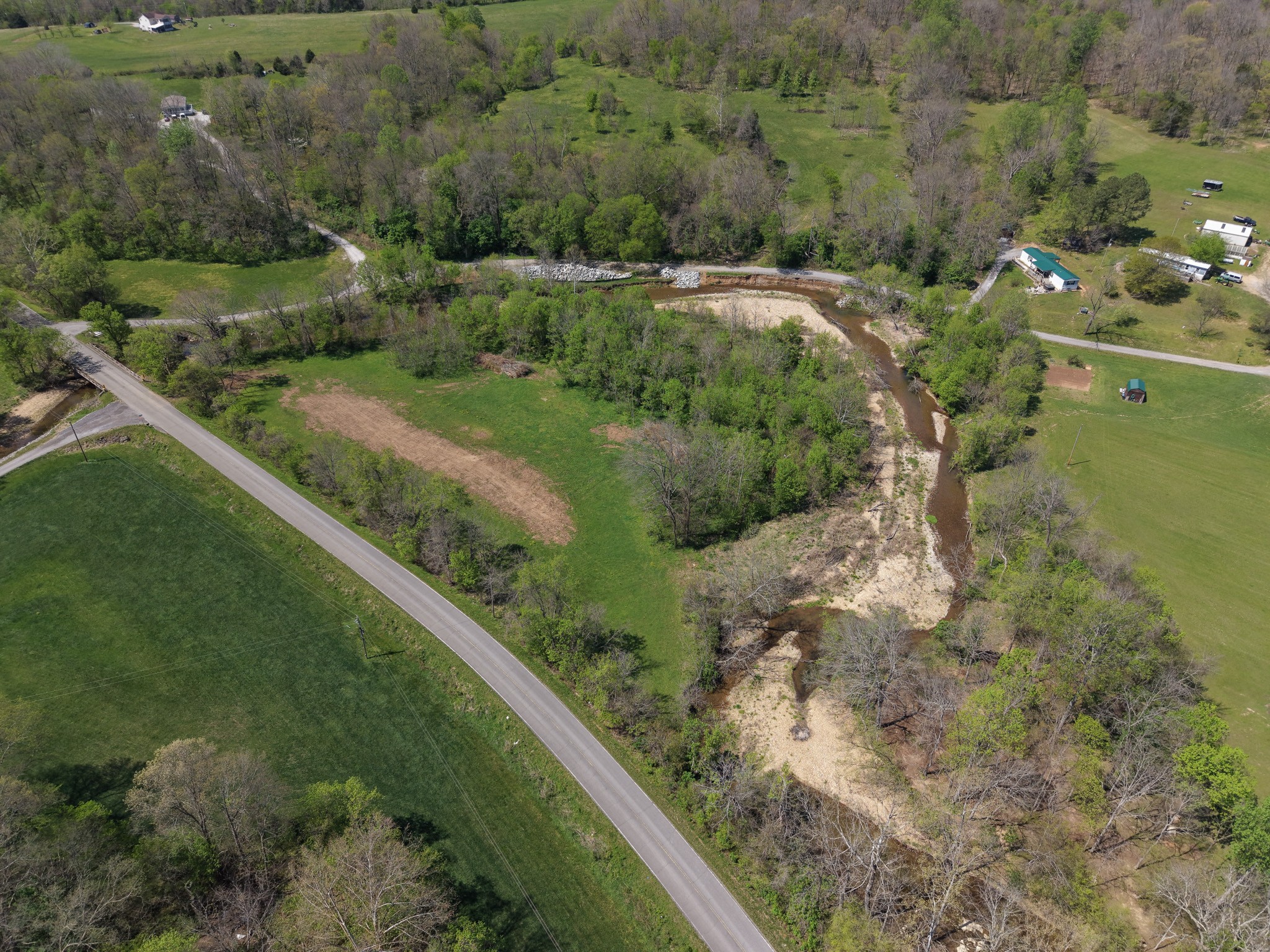 0 Batson Road Cumberland Furnace, TN 37051 - Photo 4 of 13 a view of a lake with green field