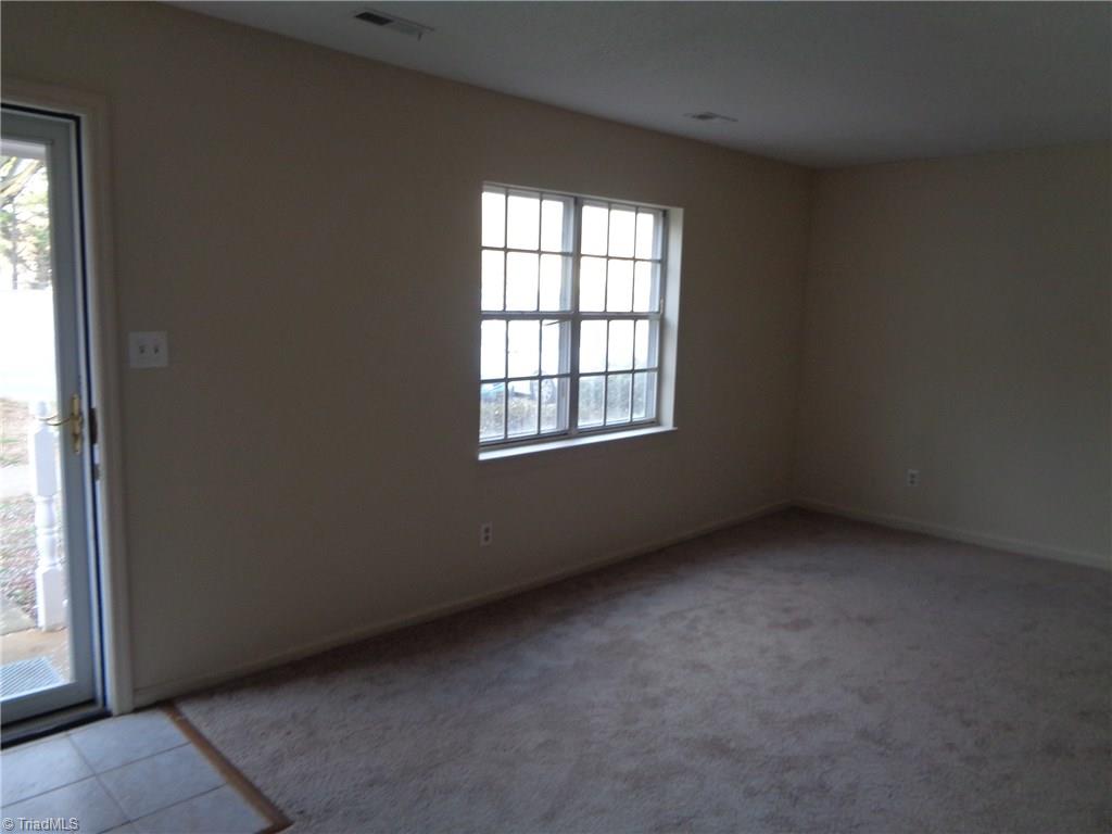 5745 Bramblegate Road Greensboro, NC 27409 - Photo 3 of 13 Another view of the living room