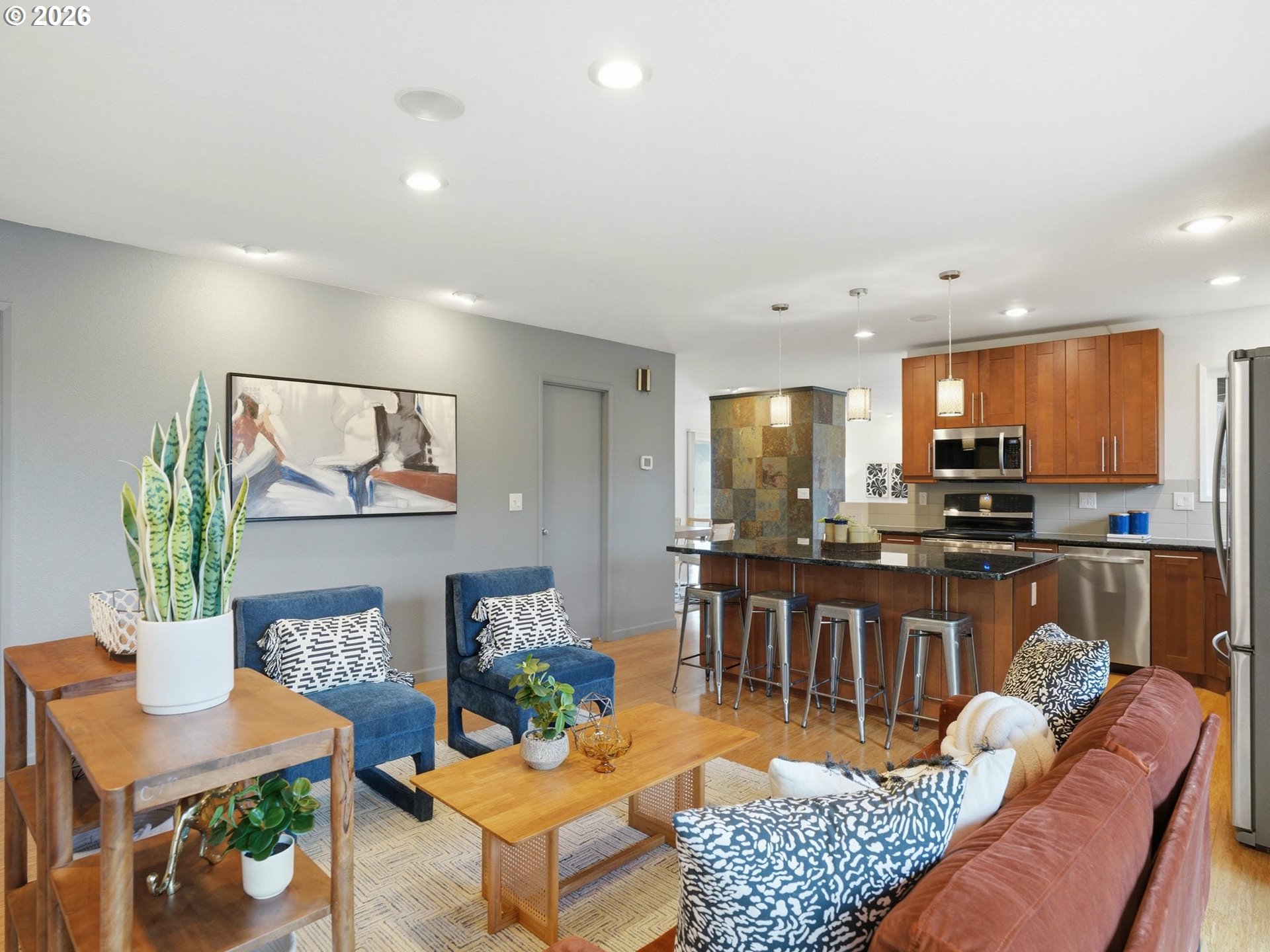 4148 Southwest 43rd Avenue Portland, OR 97221 - Photo 14 of 44 a living room with furniture kitchen view and a table