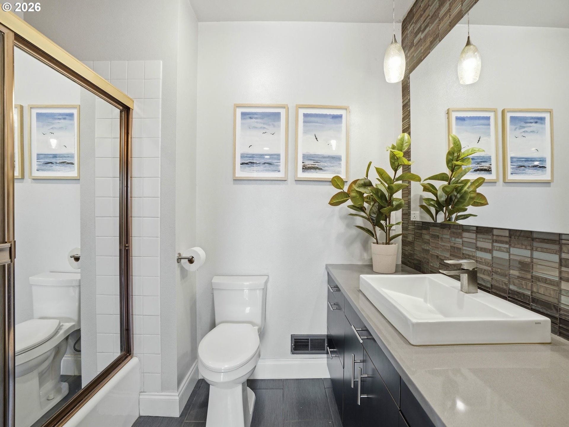 4148 Southwest 43rd Avenue Portland, OR 97221 - Photo 19 of 44 a bathroom with a sink toilet and a mirror
