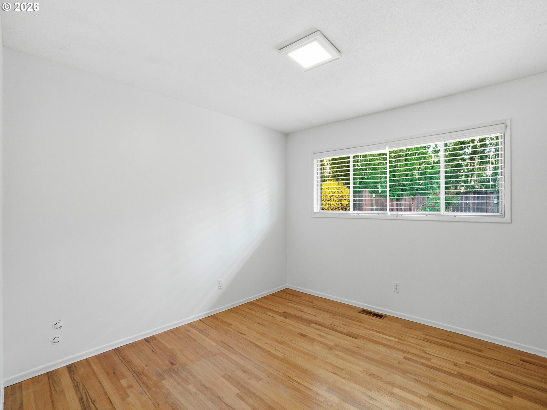 4148 Southwest 43rd Avenue Portland, OR 97221 - Photo 20 of 44 an empty room with a window