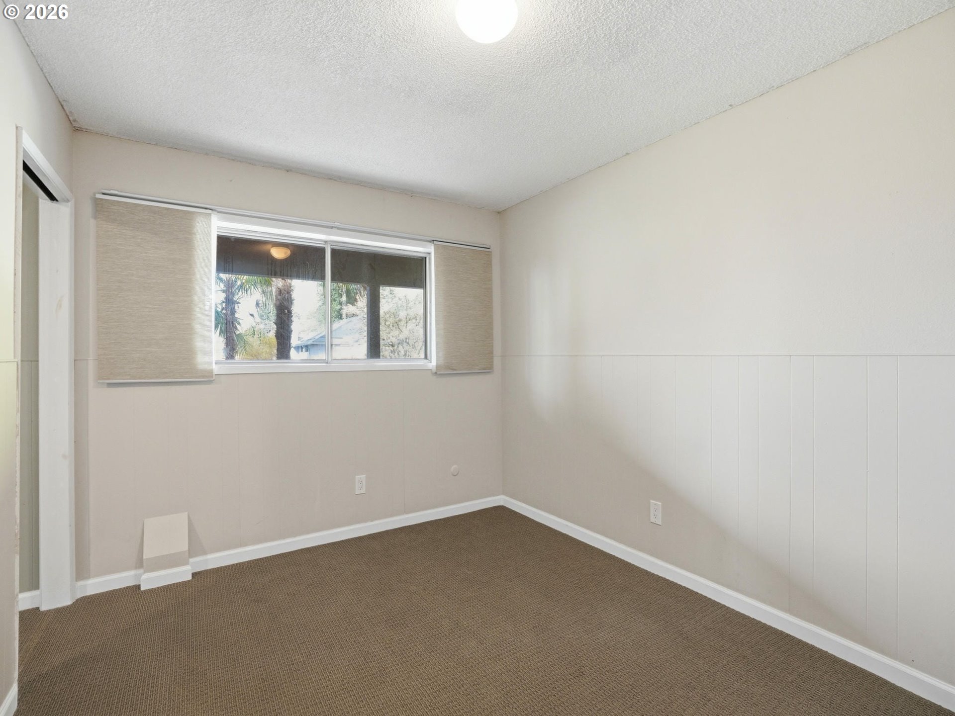 4148 Southwest 43rd Avenue Portland, OR 97221 - Photo 27 of 44 an empty room with a window